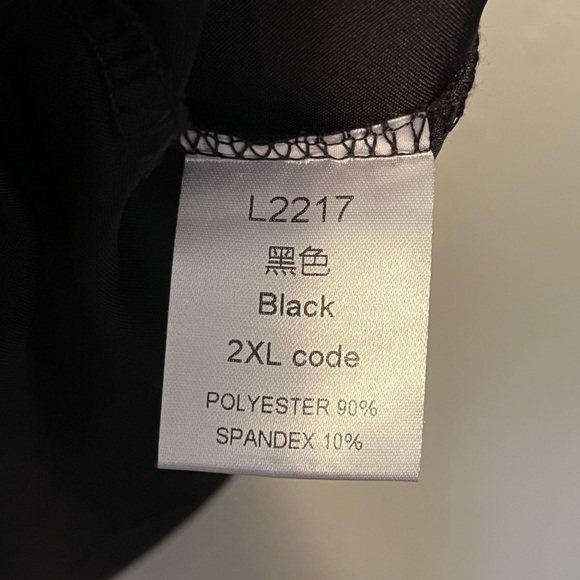 Elegant Black Sleeveless Top with Lace Detail - Picture 4 of 8